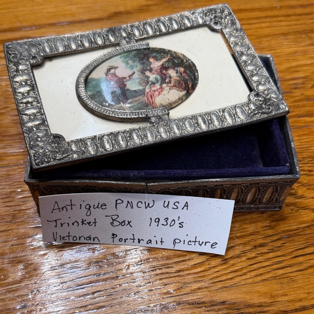 Antique P.N.C.W. Victorian framed trinket box.  Has split on side of metal.